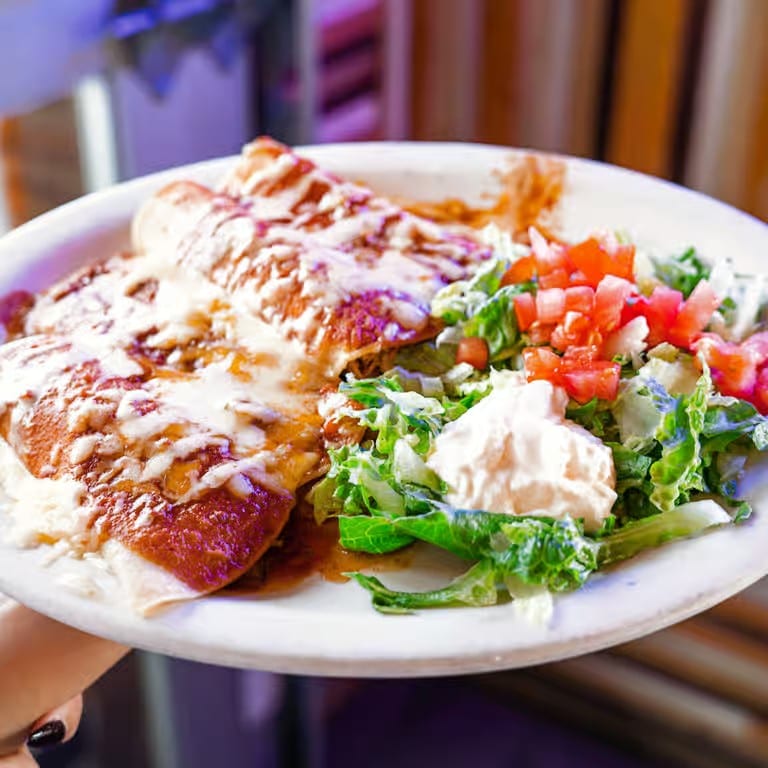 26. Enchiladas Supreme Platter.