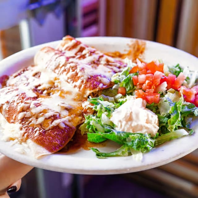 26. Enchiladas Supreme Platter.